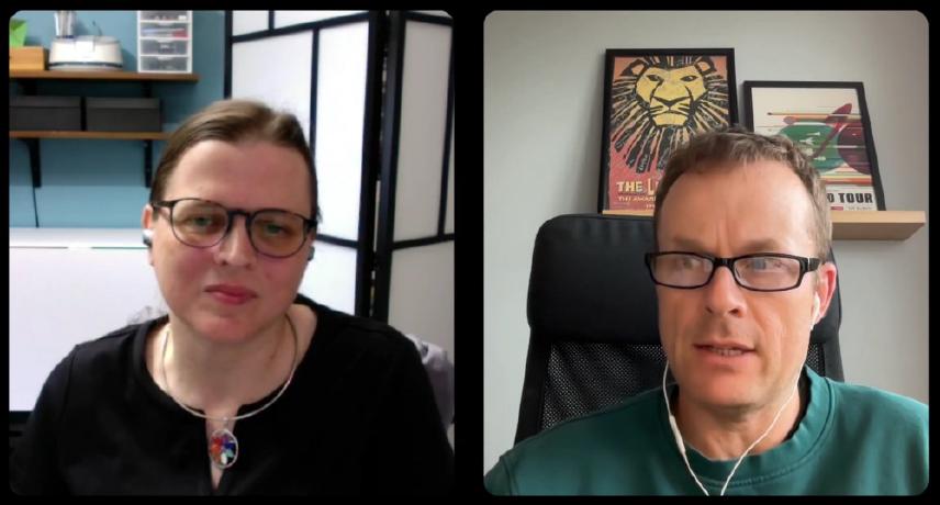A woman and a man in a web meeting.
