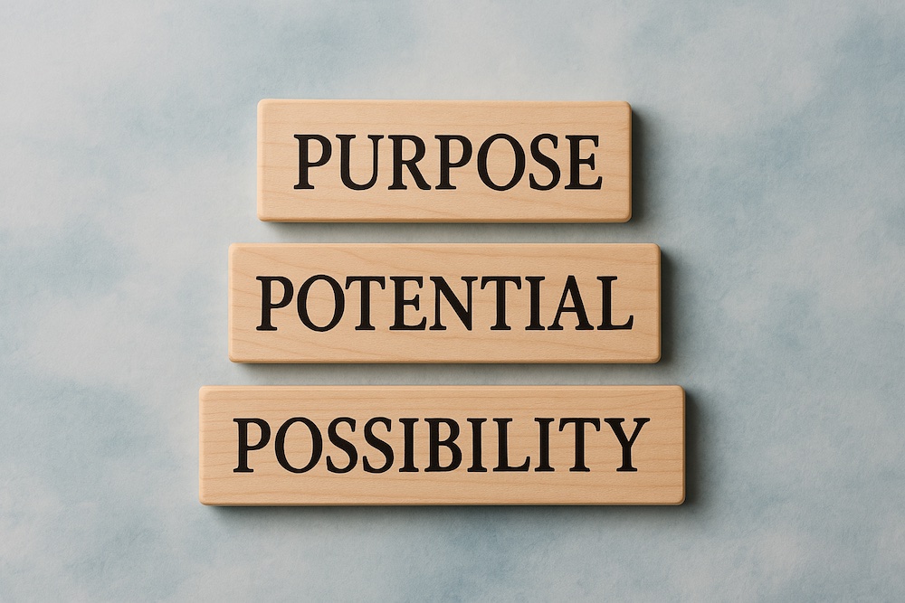 Blocks on a neutral background with the words purpose, potential, and possibility.